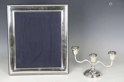 An Elizabeth II silver mounted rectangular photograph frame ...