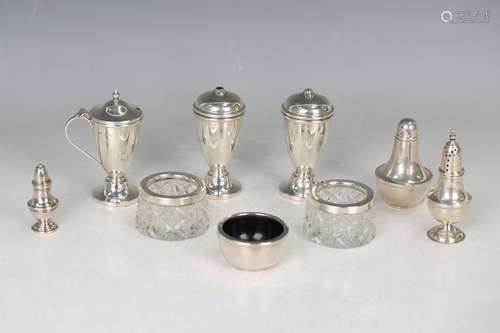 A George V silver three-piece condiment set of tapering form...