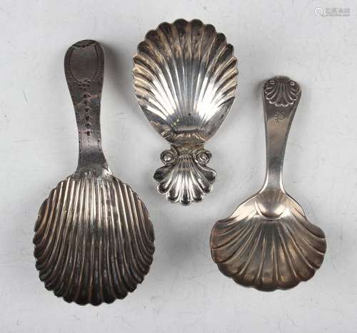 A George III silver caddy spoon with scallop shell bowl and ...