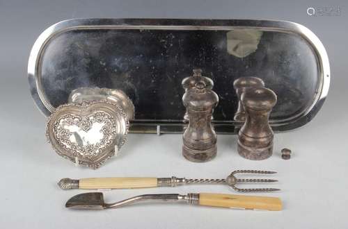 A pair of Elizabeth II silver pepper mills