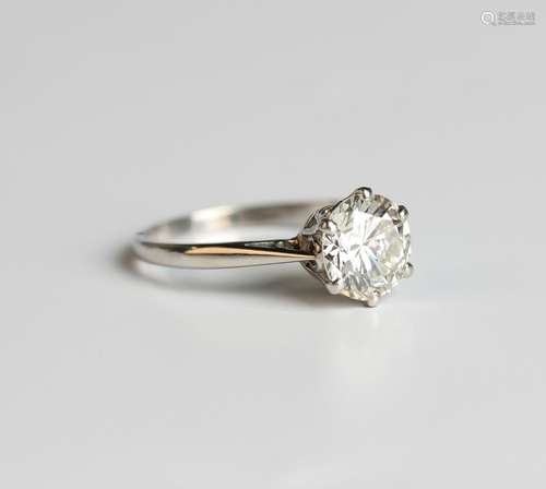 A platinum and diamond single stone ring