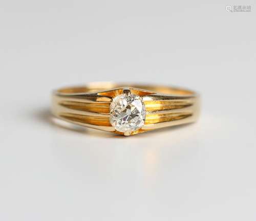 An 18ct gold and diamond single stone ring