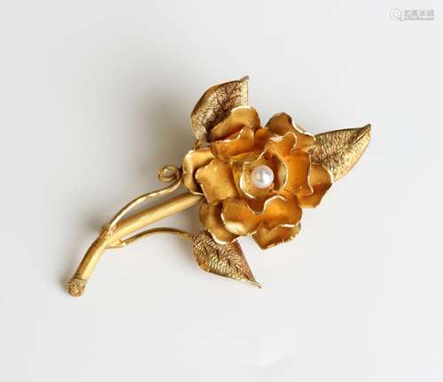 A gold and cultured pearl brooch