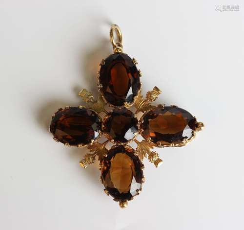 A gold and smoky quartz pendant brooch