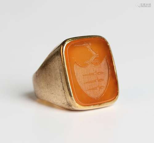 A gold and cornelian rectangular signet ring