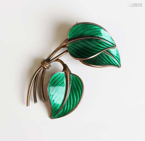 A Norwegian sterling silver and green enamelled brooch