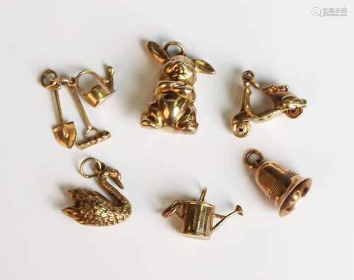 Six 9ct gold charms