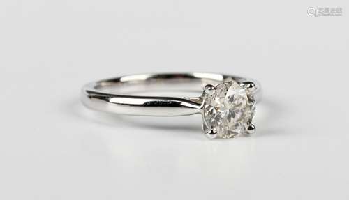 A white gold and diamond single stone ring