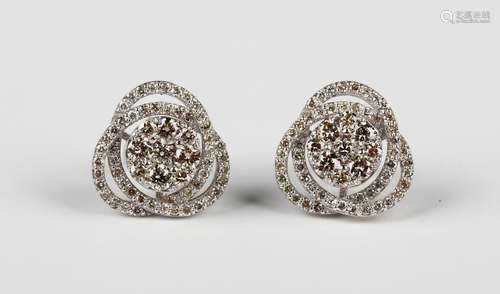 A pair of white gold and diamond earstuds