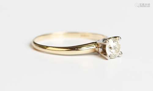 A 14ct gold and diamond single stone ring