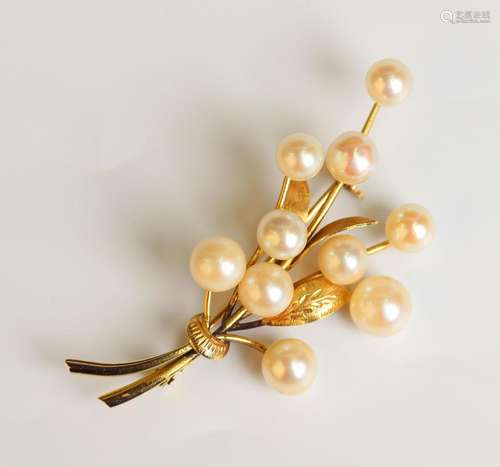 A gold and cultured pearl brooch