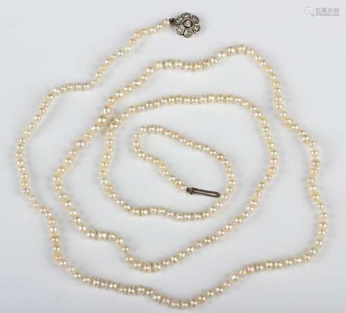 A single row necklace of two hundred and twenty-seven slight...