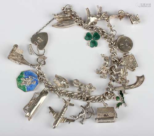 A silver curblink charm bracelet