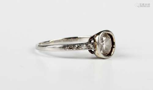 A platinum and diamond ring