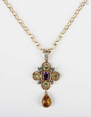 A 9ct gold and varicoloured gemstone set pendant in a quatre...