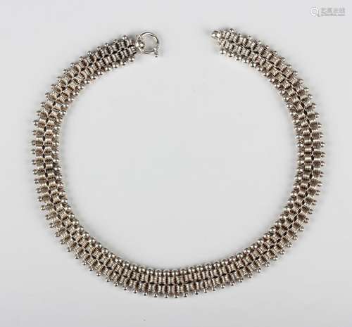 A Victorian silver collar necklace with two rows of star dec...