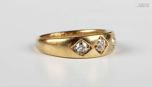 An 18ct gold and diamond three stone ring