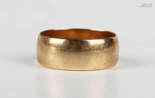 A 9ct gold wide band wedding ring