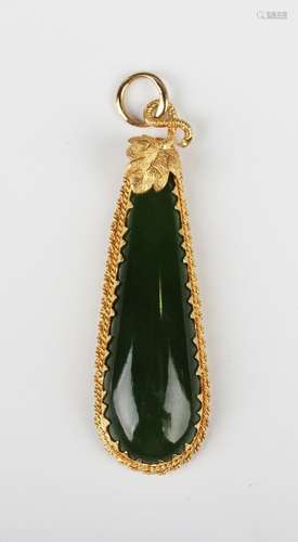 A gold and jade pendant of elongated drop form with a leaf a...