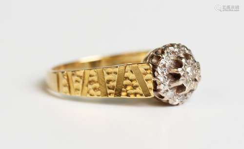 An 18ct gold and diamond cluster ring