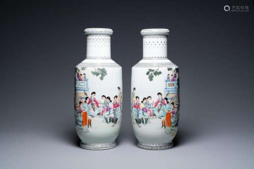 A pair of Chinese famille rose rouleau vases with musicians,...