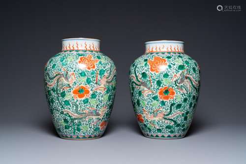 A pair of Chinese famille verte 'phoenix' vases, 19th C.