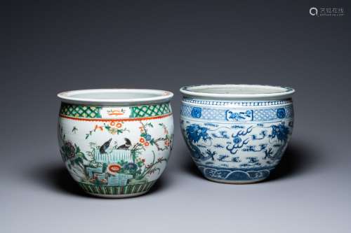 A Chinese blue and white 'dragons' fish bowl and a famille v...