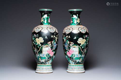 A pair of Chinese famille noire vases, 19th C.