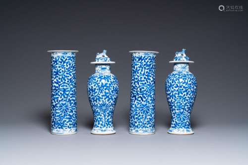 A Chinese blue and white four-piece garniture, Kangxi mark, ...