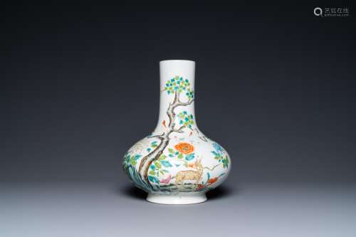 A Chinese famille rose bottle vase with a deer and cranes, 1...
