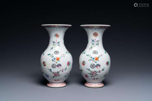 A pair of Chinese famille rose vases, Yongzheng mark, 19/20t...