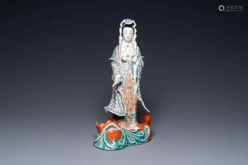 A large Chinese famille rose figure of Guanyin on a fish, Hu...