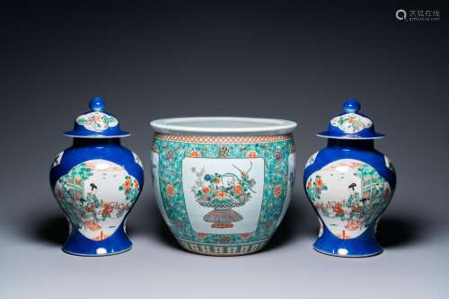 A pair of Chinese famille verte powder blue-ground vases and...