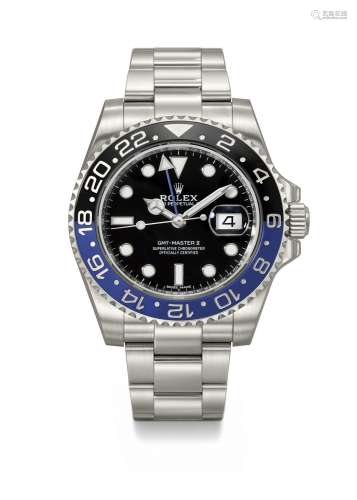 ROLEX. A STAINLESS STEEL AUTOMATIC DUAL TIME WRISTWATCH WITH...