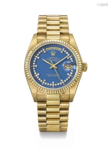 ROLEX. A RARE AND HIGHLY ATTRACTIVE 18K GOLD AND DIAMOND-SET...