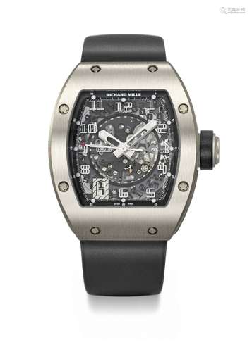 RICHARD MILLE. A RARE AND ATTRACTIVE TITANIUM TONNEAU-SHAPED...