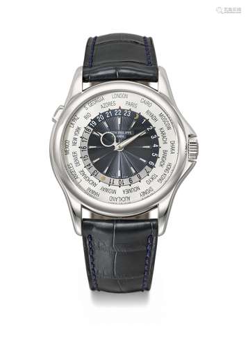 PATEK PHILIPPE. AN ATTRACTIVE PLATINUM AUTOMATIC WORLD TIME ...