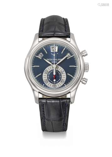 PATEK PHILIPPE. AN ATTRACTIVE PLATINUM AUTOMATIC ANNUAL CALE...