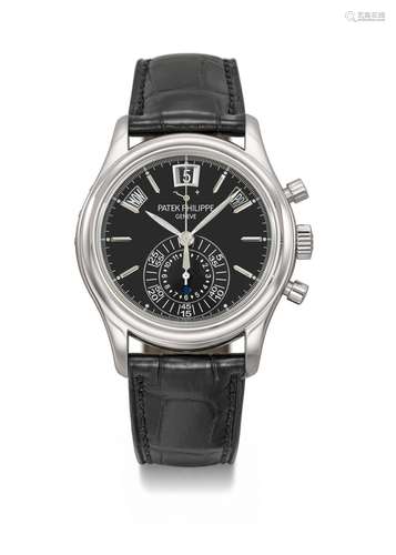 PATEK PHILIPPE. AN ATTRACTIVE PLATINUM AUTOMATIC ANNUAL CALE...