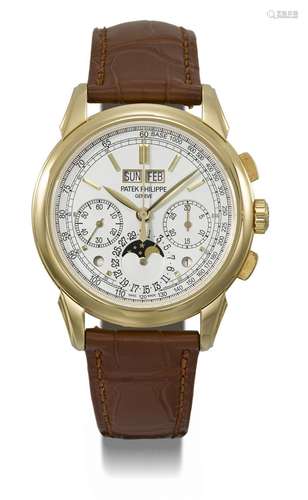 PATEK PHILIPPE. A RARE AND ATTRACTIVE 18K GOLD PERPETUAL CAL...