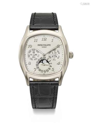 PATEK PHILIPPE. A RARE 18K WHITE GOLD PERPETUAL CALENDAR CUS...