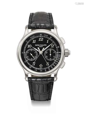 PATEK PHILIPPE. A VERY RARE PLATINUM SPLIT SECONDS CHRONOGRA...