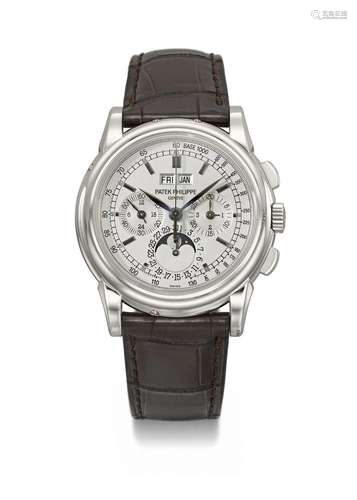 PATEK PHILIPPE. A LARGE AND RARE 18K WHITE GOLD PERPETUAL CA...