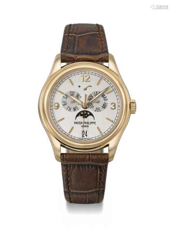 PATEK PHILIPPE. A RARE 18K PINK GOLD LIMITED EDITION ANNUAL ...