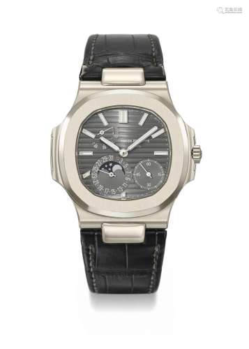 PATEK PHILIPPE. AN ATTRACTIVE 18K WHITE GOLD AUTOMATIC WRIST...