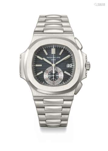 PATEK PHILIPPE. AN ATTRACTIVE STAINLESS STEEL AUTOMATIC FLYB...