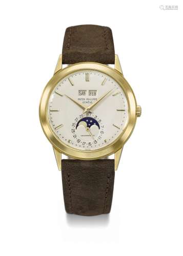 PATEK PHILIPPE. A VERY FINE AND RARE 18K GOLD AUTOMATIC PERP...
