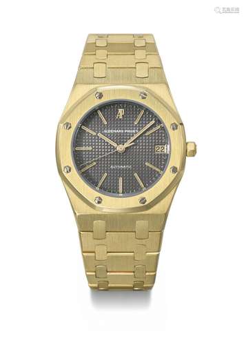 AUDEMARS PIGUET. AN ATTRACTIVE 18K GOLD AUTOMATIC WRISTWATCH...