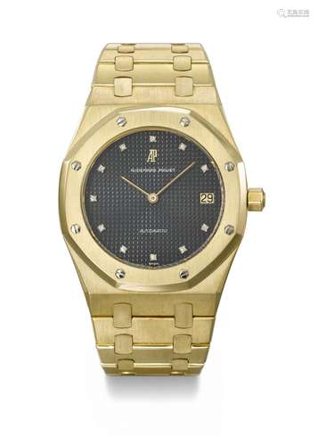 AUDEMARS PIGUET . AN EXTREMELY RARE 18K GOLD AUTOMATIC WRIST...