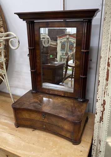 A 19th century Continental mahogany toilet mirror, with conc...